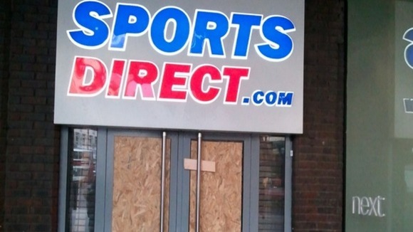 Damage caused by Newcastle Fans who vandalised doors and windows of Sports Direct stores in Newcastle