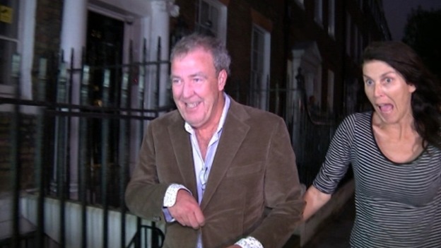 The Top Gear presenter smiles after leaving the Brooks' home.