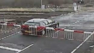 Car trapped within barriers