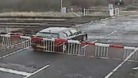 Car trapped within barriers