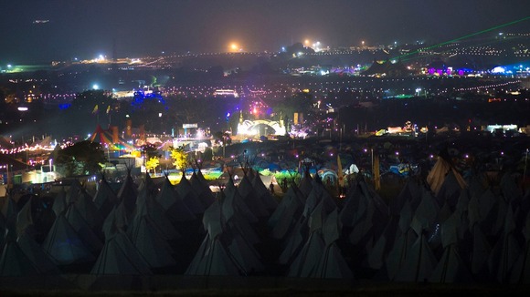 A general view at night-time of the Glastonbury Festival.