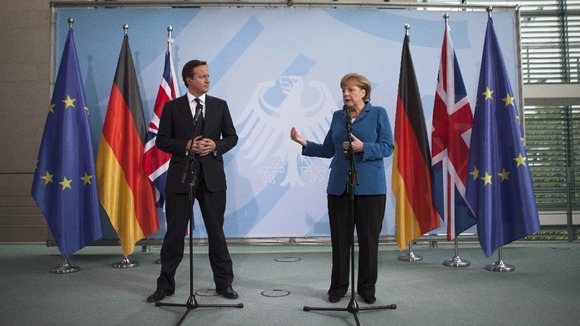German Chancellor Angela Merkel and David Cameron discuss the Eurozone in Berlin on Thursday.