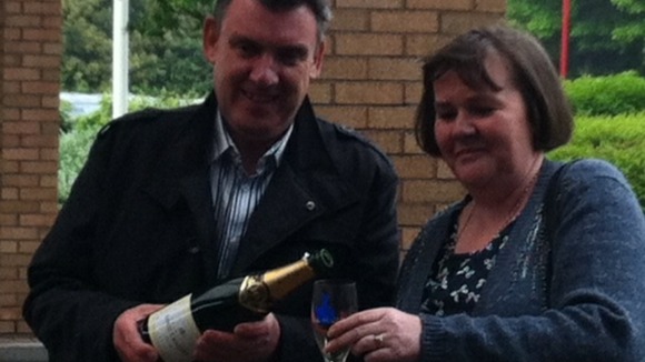 John and Karen Ord Popping the Champagne