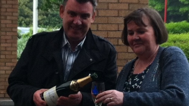 John and Karen Ord Popping the Champagne