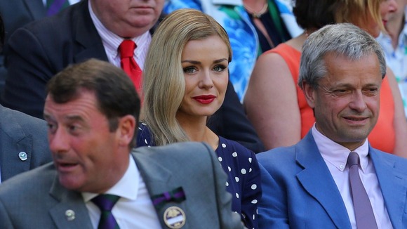 Katherine Jenkins wore a navy blue spotted dress to watch the match from the Royal Box on Centre Court.