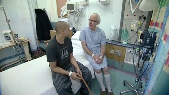 Louis and Mike Powis on hospital bed