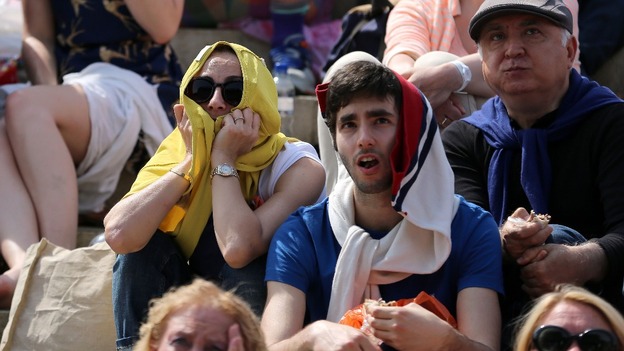 Fans watch on from Murray's Mount with dropped jaws as he loses the quarter-finals.
