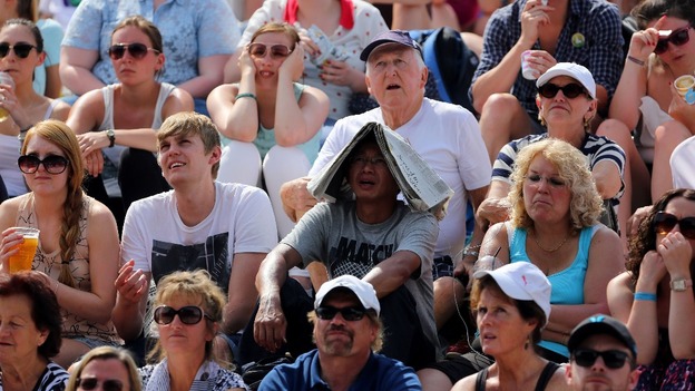 Tennis fans sheltering form the sun appeared sad at Murray's shock exit.