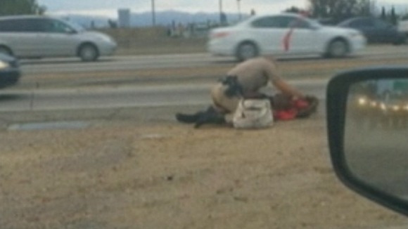 The woman had apparently been restrained after 'endangering herself and the motoring public.'
