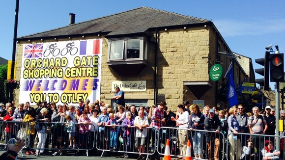 Spectators gather in the sunshine in Otley ahead of the race.