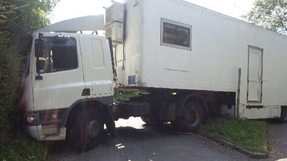 A lorry driver got his truck stuck down a narrow country lane after following his sat nav, said police.