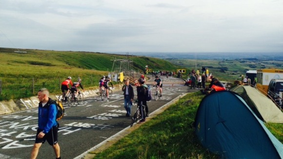 Spectators and campers prepare for the second stage of Le Tour.