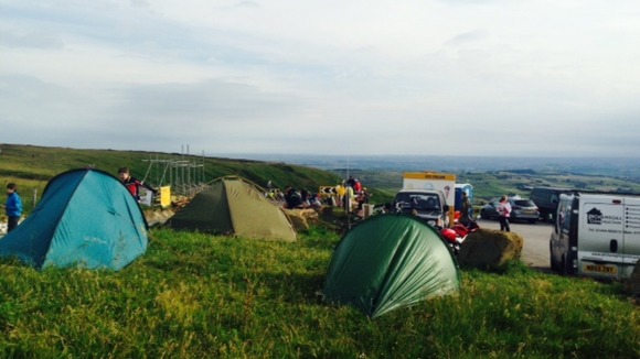Cycling enthusiasts camped overnight in Holme Moss, West Yorkshire.