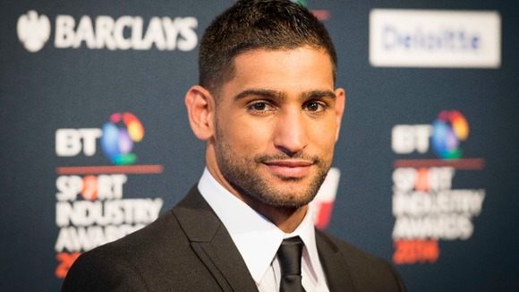 Allegations champion boxer Amir Khan assaulted two youths have been dropped.