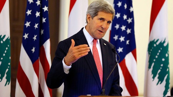 US Secretary of State John Kerry has warned aid to Afghanistan will be cut if any party tries to seize power illegally.
