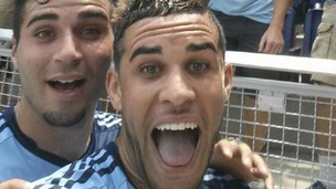 Dom Dwyer celebrates scoring with a 'selfie'.