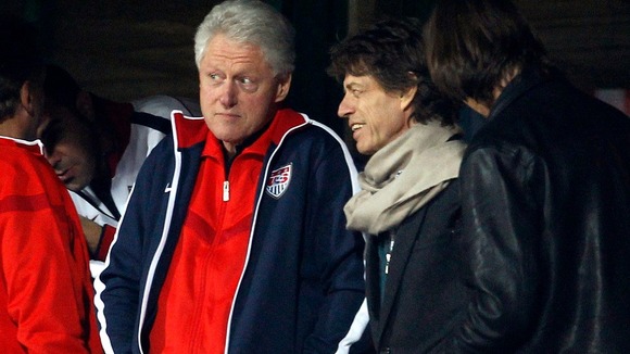 Jagger and Clinton watch the 2010 World Cup second round match.