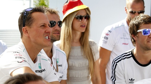Formula One driver watches Germany v Portugal.