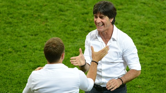Joachim Low celebrates with his assistant Hans-Dieter Flick.