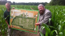 Brian Blessed with a plan of the maze