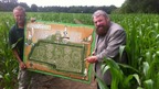Brian Blessed with a plan of the maze