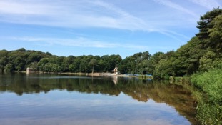 Talkin Tarn and blue skies and trees
