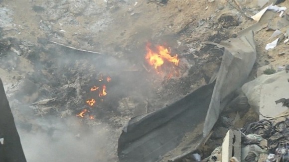 Fire was still burning in the rubble of the building hours after the attack.