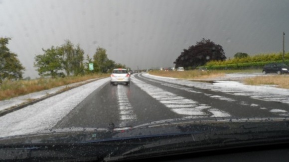 Hail and surface water flooding on the A47 near Acle, Norfolk on Friday 27 June.