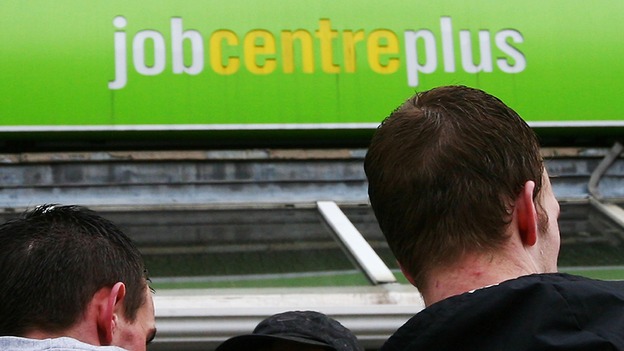 Men outside a Job Centre Plus branch