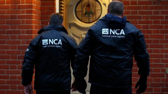 NCA officers attend an address on a previous operation.