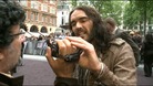 Russell Brand grabs a camera