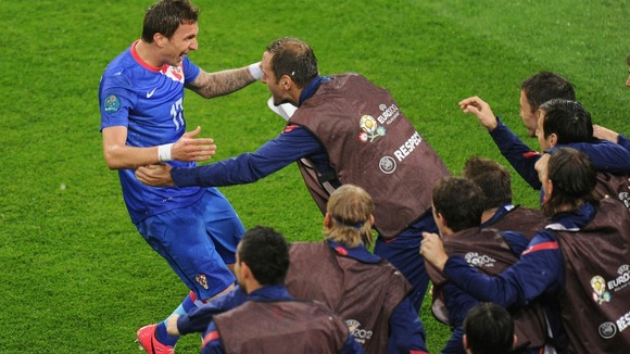 Mario Mandzukic celebrates his first goal against Ireland.