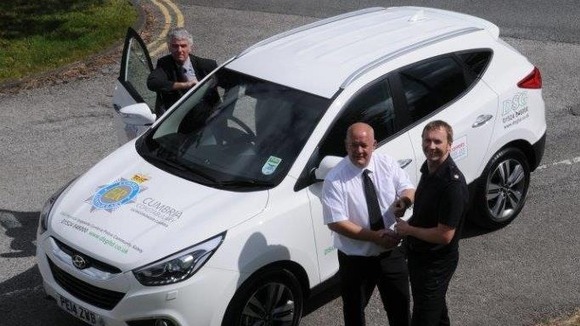 Crime Prevention Officer Terry Belshaw, DSG Morecambe Ltd’s Senior Sales Executive Dougie Stokes and Superintendent Mark Pannone
