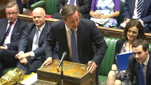 David Cameron makes a joke as George Osborne eyeballs the opposition.
