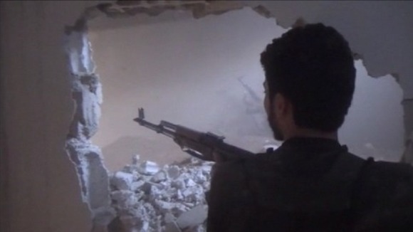 The rebels break through into the building occupied by the Syrian regime.