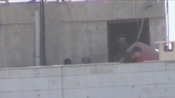 The rebel unit breaks through to the roof of the building, effectively completing their assault.