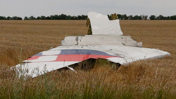 A part of the wreckage of a Malaysia Airlines Boeing 777 plane is seen after it crashed