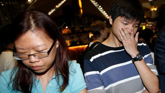 People, who said they believed their relatives were on Malaysia Airlines flight MH17