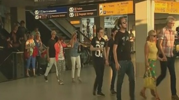 Passengers seen leaving Amsterdam's international airport