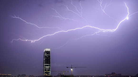 These opposite charges are strongly attracted to each other, resulting in a huge rapid electrical discharge, a flash of lightning.