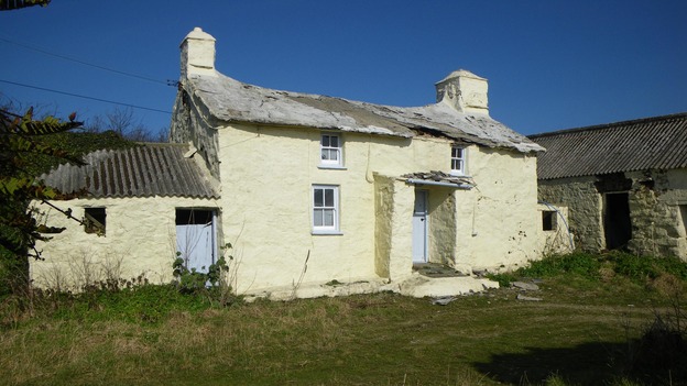 small yellow cottage