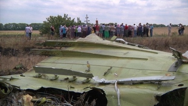 Local villagers took part in a memorial service near the crash site as the investigators assessed the wreckage.