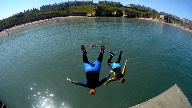 The fisheye lens captured people jumping in the water at Cullercoats, North Tyneside as temperatures hit the high 20s.