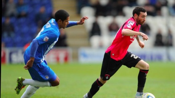 David Worrall in action (right) in action for Oldham Athletic last season.