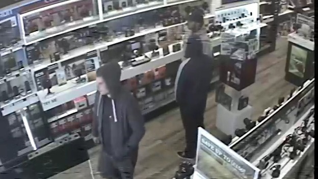 CCTV image of the three suspects in the store