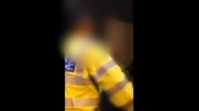 Police officer threatens to "knock out" woman