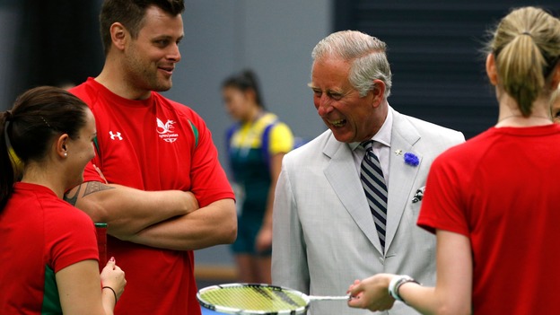 Prince Charles greets members meets members of the Wales badminton team during the build-up to Glasgow's 2014 Commonwealth Games opening ceremony.