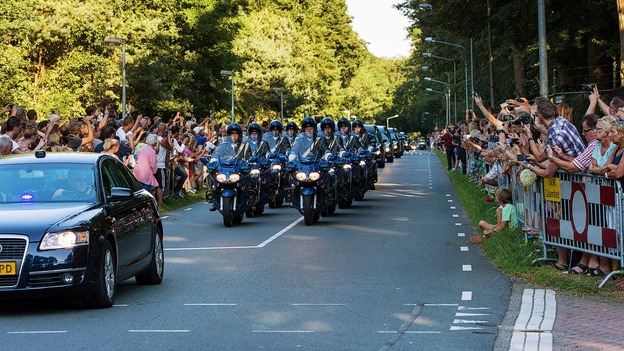 Thousands of mourners gather to show their respects to the MH17 dead.