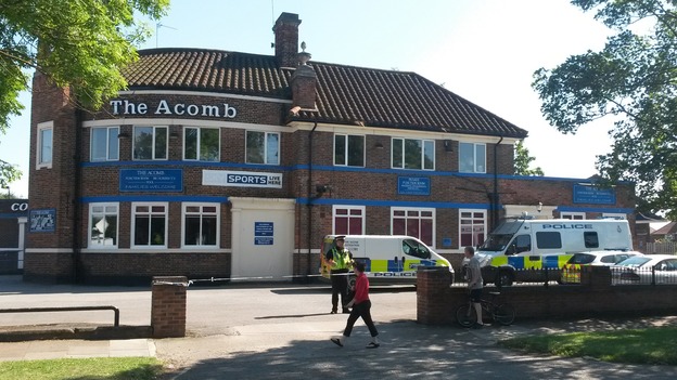 Police search The Acomb pub in York.