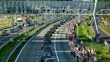Bells toll across Holland as first victims of MH17 arrive